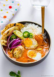 Egg Curry Tikka Masala Sauce Naan And Rice For Indian Egg Curry Dinner Indian Food Recipes Recipes Tikka Masala Recipe