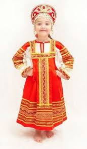A Pretty Smiling Girl Is Dressed In The Russian Traditional Costume A Kokoshnik A Headdress An Embroidered Blo Idei Kostyumov Detskie Kostyumy Zhenskij Kostyum