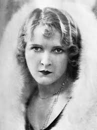 The actress Olive Borden as Eve Smith in the film "Fig Leaves," 1926.  Photographed by Max Munn Autrey (1891-1971).