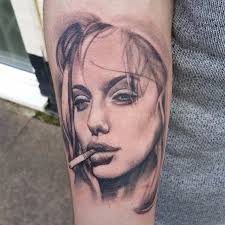 10 Enticing And Fierce Angelina Jolie Tattoos Tattoodo