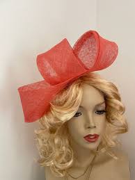 Fascinator Hat Coral Orange Twist Loop Headpiece
