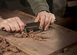 Either a very sharp edge or a small hook on the edge. Why You Need A Cabinet Scraper Finewoodworking