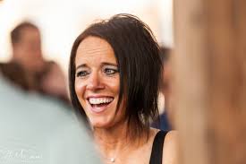 Does anyone know who, or how to contact the gal that was taking each  classes' group photos Sat pm at the 70s Decade Reunion? She appeared to be  a pro photographer. I'd