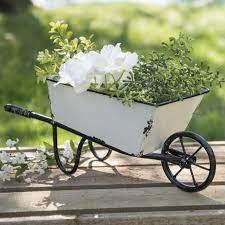 800 x 800 jpeg 38 кб. Decorative Wheelbarrow Planter White Metal 12 5 Decorative Display Modern Design Wheelbarrow Planter Wheelbarrow Wheelbarrow Decor