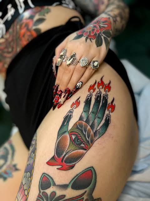 What are some ideas for spooky finger tattoos?