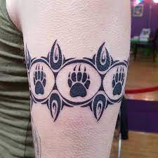 Bear Paw Tattoo 45 Claw Print Tattoo Ideas January 2021 Bear Paw Tattoos Bear Tattoo Designs Bear Claw Tattoo