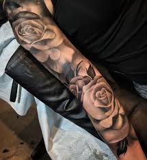 While a rose tattoo isn't the first thought you have when you think of badass tattoo ideas for men to get, there are actually a number. Rose Tattoo Sleeve Feminine Tattoo Sleeves Sleeve Tattoos