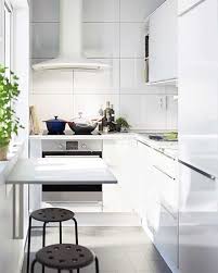 Küçük bir mutfak için katlanan mutfak masalarını seçiyoruz. Kucuk Yemek Masalari Dar Alanlar Icin Mukemmel Bir Secim