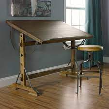 This allows the drafting desk to be angled for drawing and drafting, set flat for use with a computer and paperwork, raised up to serve as a standing desk, or set low to use while seated. Drafting Table Vs Standing Desk Architect Table Architects Desk Drafting Desk