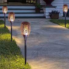 Pack Of 4 Solar Tiki Torch Light Flame Garden Lights 96 Led Waterproof Dusk To Dawn Auto On Off Flickering Flames Torches Lights Landscape Lighting Outdoor Pa In 2021 Outdoor Path Lighting Outdoor