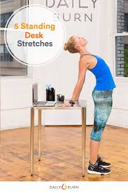 5 Standing Desk Stretches To Relieve Stress Now How To Relieve Stress Desk Stretching Workout For Beginners