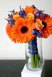 Simple Small Wedding Bouquets Design Blue And Orange Flowers Bouquet Using Gerbera Daisies And De Orange Flower Bouquets Small Wedding Bouquets Orange Bouquets Use these flower arranging techniques to beautifully display blooms and once you learn the basics, flower arranging can be both fun and simple. orange flower bouquets