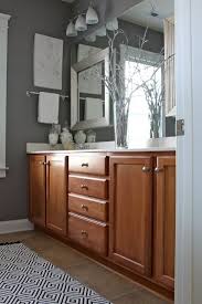 Dwellings By Devore Master Bathroom Bathroom Wall Colors Gray Bathroom Walls Brown Cabinets