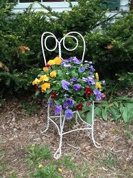 Lovely Pansies In An Ice Cream Chair Chair Planter Garden Chairs Creative Gardening
