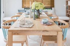Amish trestle solid wood tables. Wooden Dining Table In Modern Dining Room With Table Set And Vase Of Plants Interior Design Concept Stock Photo Picture And Royalty Free Image Image 80198838