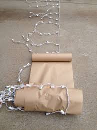 Icicle Light Storage Rolled Around Masking Paper Christmas Storage Christmas Decoration Storage Diy Christmas Lights