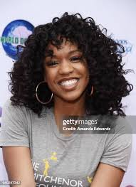 1.249 Michelle Curly Stock Photos, High-Res Pictures, and Images