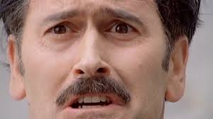 MAN WITH THE SCREAMING BRAIN (2005) Reviews and overview