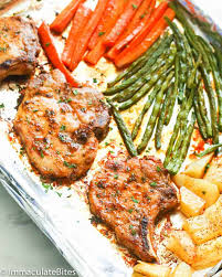 Pat the pork dry with paper towels. Oven Baked Pork Chops Immaculate Bites