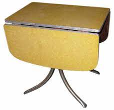 You can also fold out just one leaf while keeping the other leaf dropped flush against a wall. Formica Kitchen Table 005 Yellow Drop Leaf H73cm W122cm D76cm First Scene Nz S Largest Prop Costume Hire Company