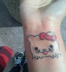 Hello kitty resin gun pistol pink glitter by littlecandysweets. Craziest Hello Kitty Tattoos