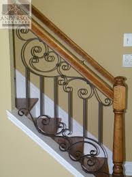 Transform your wrought iron handrails to a cleaner, modern handrail by grinding off the scrolls! Wrought Iron Railing Custom And Pre Designed Anderson Ironworks