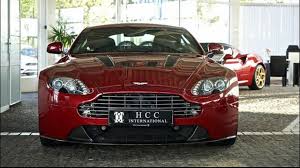 Image result for Magma Red 2011 Aston Martin