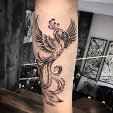 A phoenix tattoo on a leg. Top 51 Best Small Phoenix Tattoo Ideas 2021 Inspiration Guide
