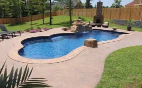 Jeans Family Pool By Dolphin Pools Of West Monroe Trilogy Fiberglass Pool Genesis Model Saltwater With Rico Fiberglass Pools Pool Landscaping Pool Waterfall