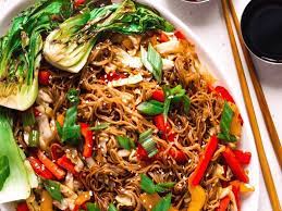 Veggie And Brown Rice Noodle Stir Fry In Ginger And Chili Oil Recipe Veggie Noodles Food Healthy Recipes