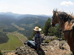 Summer horseback riding | photo: Horseback Riding Montana At Elkhorn Ranch Near Yellowstone