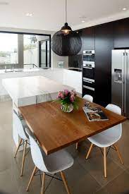 This kitchen island with table extension has been designed to include a breakfast area. Contemporary Kitchen Design Contemporary Kitchen Cabinets Modern Kitchen Contemporary Kitchen