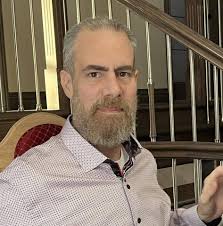 Looking for a book series with a strong system of magic and schools/groups,  like the Black Magician Trilogy by Trudi Canavan