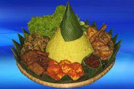 Nasi Kuning Yellow Rice And Fixins Indonesian Cuisine Food Indonesian Food