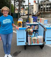 CHECK OUT OUR NEW DIGS A BICYCLE BUILT FOR BOOKS MEET THE BUTTON LADY