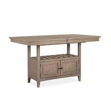 Supported by a graceful pedestal stand that features four elegantly carved legs. D4805 42t Magnussen Home Furniture Wood Counter Dining Table