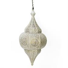 The light fixture features a canopy decorated in relief with a moroccan design. Pin On Bohome