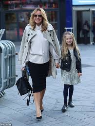 Amanda holden made sure her daughter's 14th birthday was celebrated in style as the youngster was serenaded by thousands at the britain's got talent auditions. Amanda Holden And Daughter Hollie Look Stylish As They Leave Global Hq Daily Mail Online