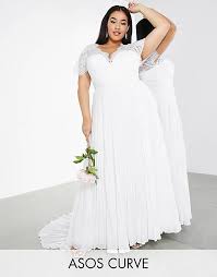 Maybe you would like to learn more about one of these? Asos Edition Curve Sophia Brautkleid Aus Spitze Mit Tiefem Ausschnitt Und Plissiertem Rock Asos