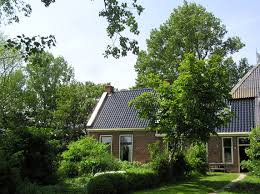 de voorzijde van ons huisje gastenverblijf terrassen buitenkant