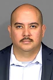 Prosecutor says officers acted 'recklessly' in Black man's death during  mental health crisis