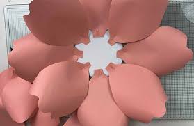 Add a large dollop of glue to the bottom of the fringed center and glue onto the center of your flower. How To Make Large Paper Flowers Like Love Do