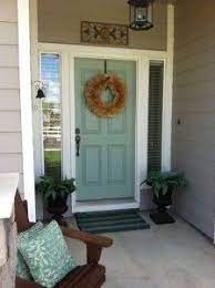 My house has white vinyl siding and a biscayne blue roof (very little blue actually, mostly shades of. The 7 Most Welcoming Colors For Your Front Door Exterior House Colors Painted Front Doors House Exterior