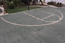 Paint, on the other hand, will stay on the surface of the concrete driveway itself, providing a strong layer of protection. Amazon Com Complete Easy Court Basketball Marking Stencil Kit Includes White Paint Made In Usa Basketball Court Accessories Sports Outdoors