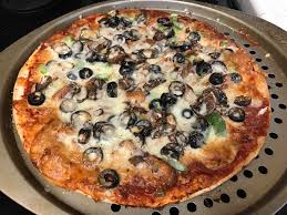 St louis style pizza is one of those regional specialties that people either love or love to hate. Homemade St Louis Style Pizza With Provel Cheese Food