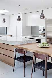 Check spelling or type a new query. The Designory North Bondi House Featuring Custom Kitchen Joinery With Integrated Dinin Kitchen Island Dining Table Modern Kitchen Design Modern Kitchen Island
