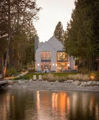 4 bedrooms and 3 baths. Modern Lake House Modern Lake House Architecture Modern Lake House Design Modern Lake House Ideas Modern Lake Hou Lakefront Homes Lake House House Exterior