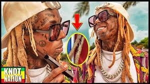 He has at least 25 tattoos on his face. Why Does Lil Wayne Have Thread In His Dreads Youtube