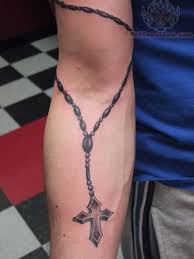 Search on info.com for rosary on arm tattoos. Rosary Tattoo On Elbow Rosary Bead Tattoo Rosary Tattoo Arm Rosary Tattoo