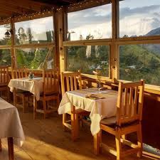 The blue sky, the dining table uses the beauty of nature to please the eye. Blue Ridge Restaurant And Cottages St Andrew Jamaica Opentable